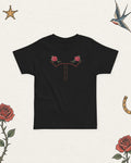 Little Rodeo Suit Toddler T-Shirt, Midnight Rose in Black, product view on pale ivory with faded colored tattoo flash.