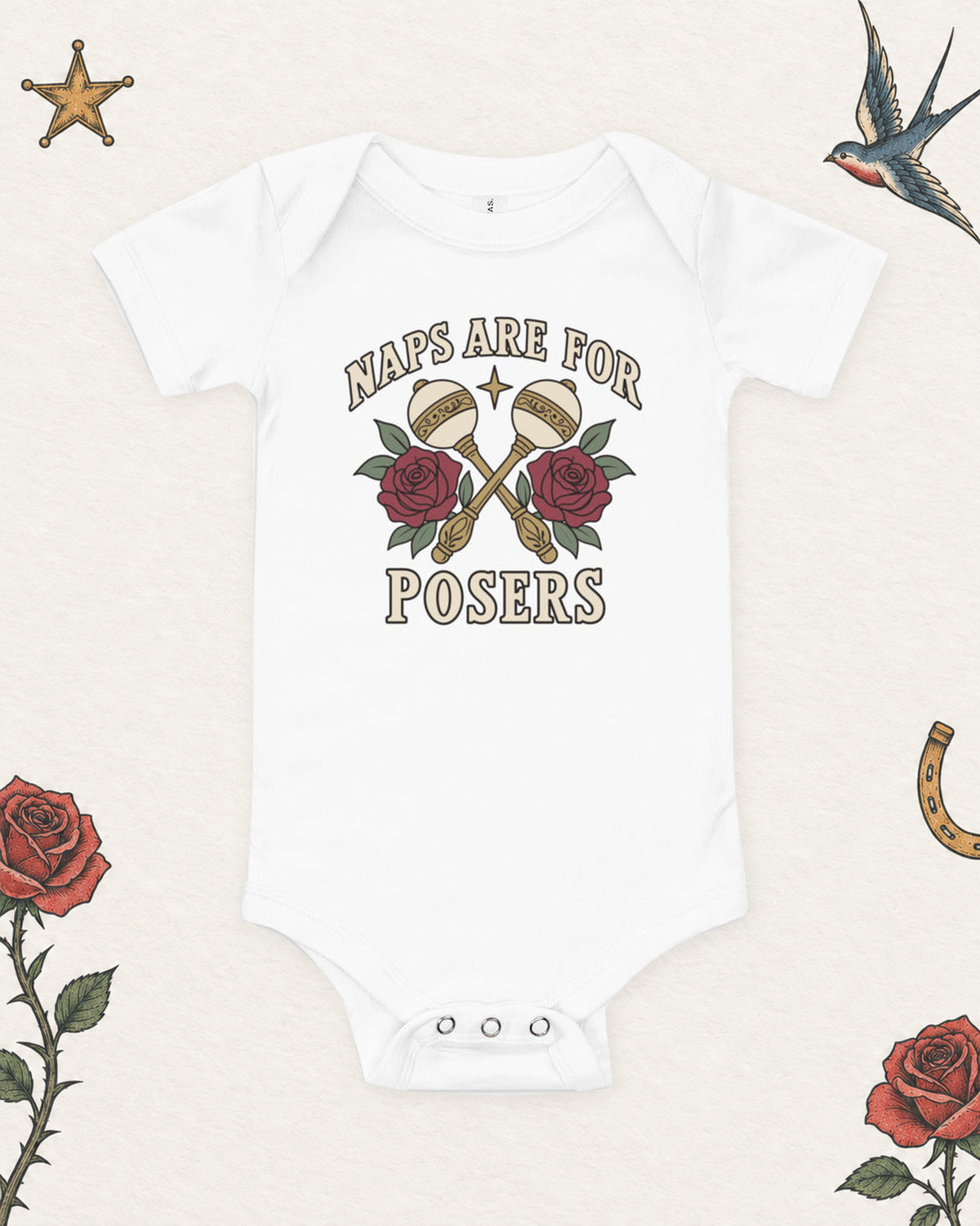 Naps Are for Posers Baby Bodysuit in White, product view on pale ivory with faded colored tattoo flash.