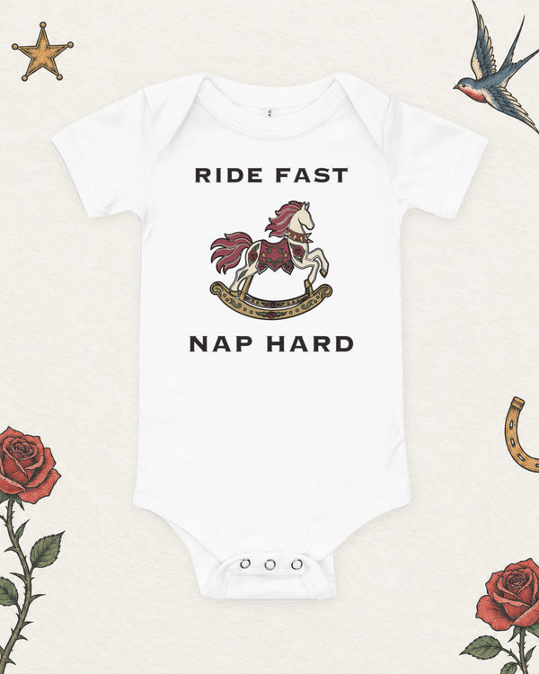 Ride Fast, Nap Hard Baby Bodysuit in White, product view on pale ivory with faded colored tattoo flash.