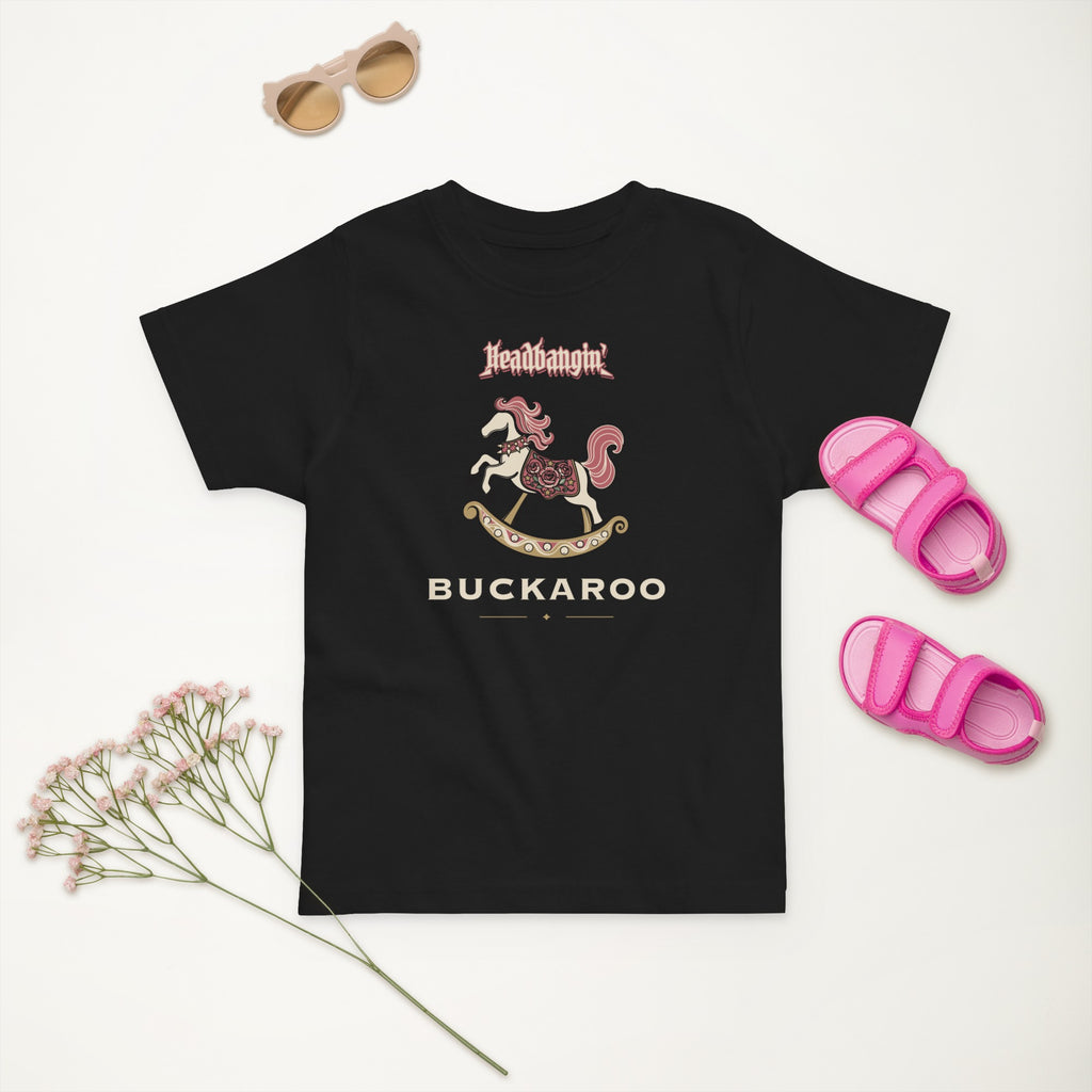 Headbangin' Buckaroo Toddler Tee in Black, styled flat lay