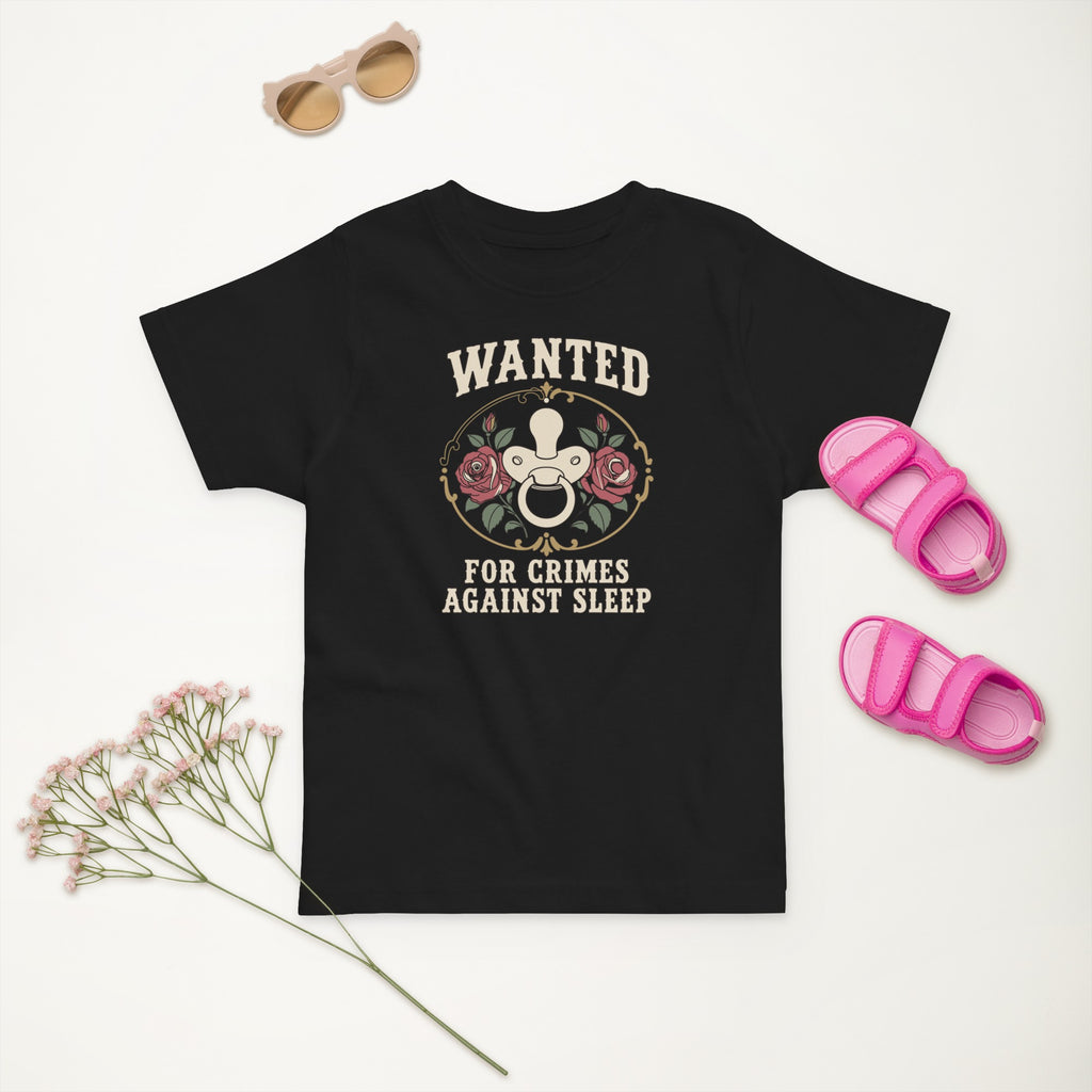 Wanted: For Crimes Against Sleep Toddler Tee in Black, styled flat lay