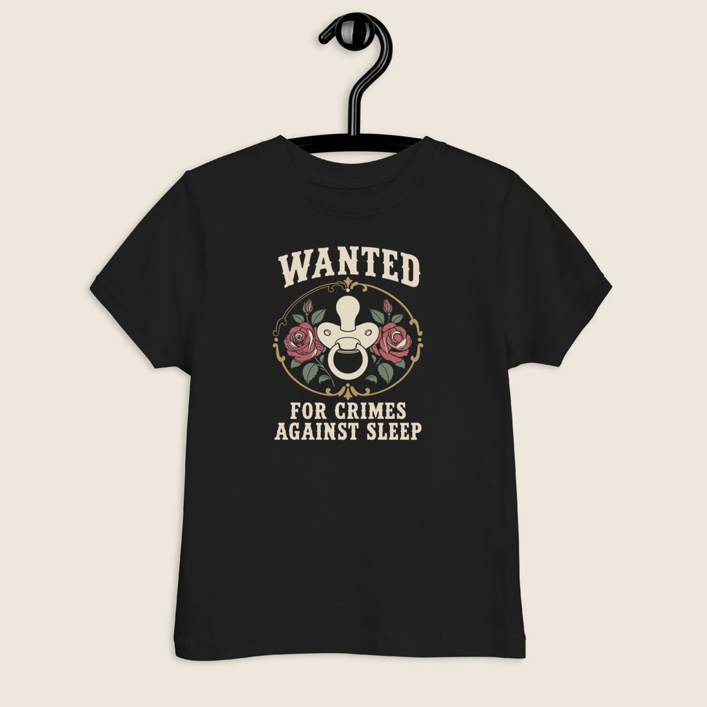 Wanted: For Crimes Against Sleep Toddler Tee in Black, front view on a hanger