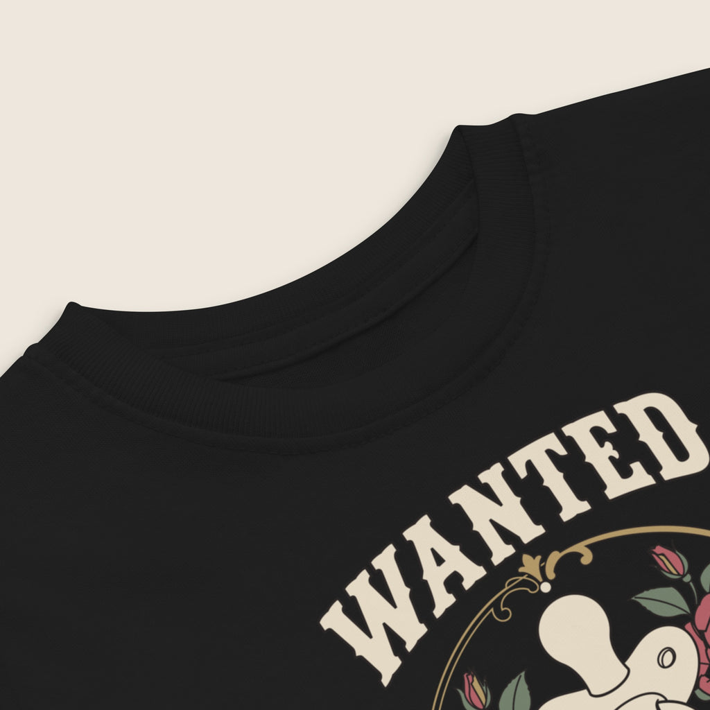 Wanted: For Crimes Against Sleep Toddler Tee in Black, close-up of the print