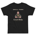 Small Town, Loud Baby Toddler Tee, black, water tower, roses and Small Town, Loud Baby lettering, product view.