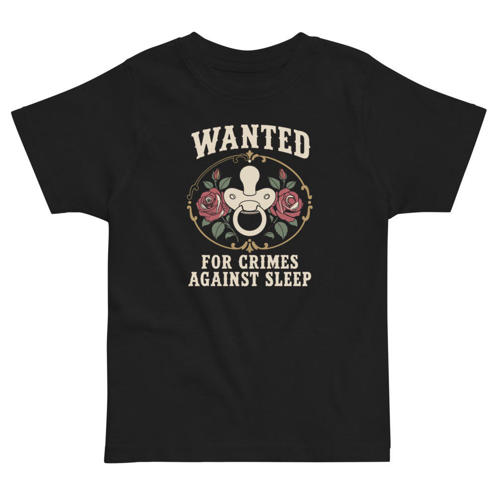 Wanted: For Crimes Against Sleep Toddler Tee, black, rose-framed pacifier cameo with western Wanted lettering, product view.