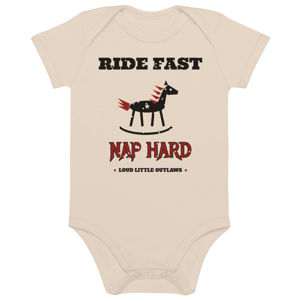 Ride Fast, Nap Hard Organic Baby Bodysuit, Natural, natural, rocking horse with a red flame mane and white stars between Ride Fast and Nap Hard lettering, front view.
