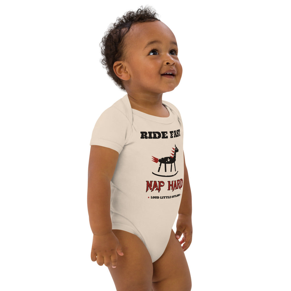 Ride Fast, Nap Hard Organic Baby Bodysuit, Natural, natural, rocking horse with a red flame mane and white stars between Ride Fast and Nap Hard lettering, front view.